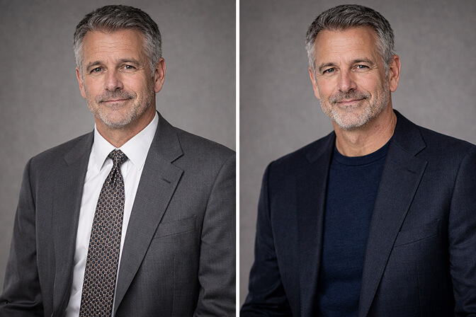 Man over 50 wearing a well-fitted navy blazer for a professional headshot