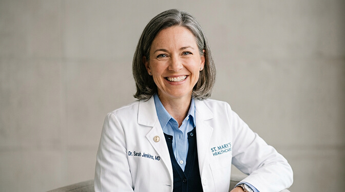 Approachable expert headshot style with genuine warm smile professional attire and inviting expression