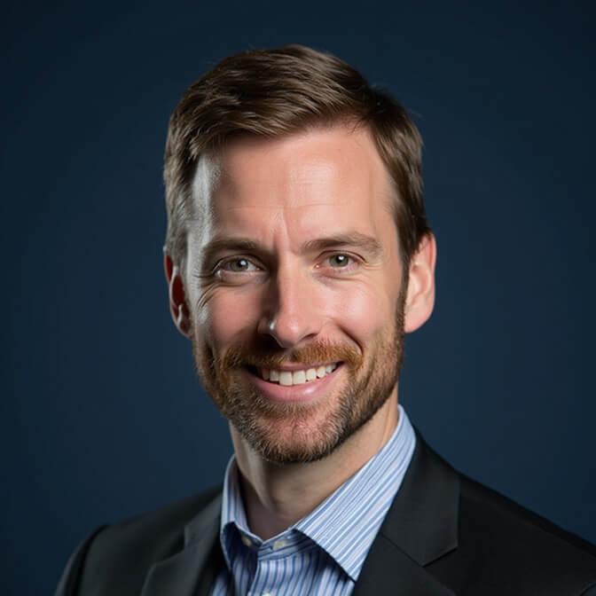 professional headshot on a navy blue background