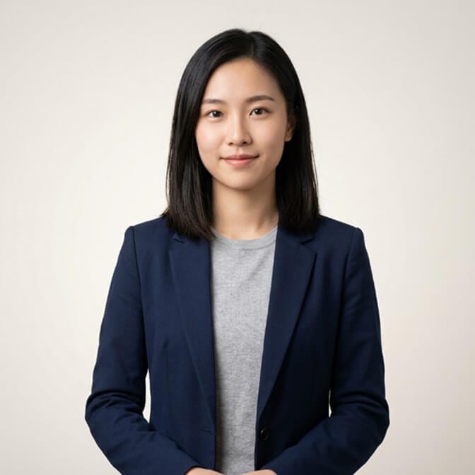 Studio-quality AI headshot of a recent graduate in a navy blazer, an affordable alternative to a studio photographer