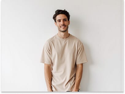 Passport photo contrast failure for a man: pale beige t-shirt photographed against a plain white background with too little contrast