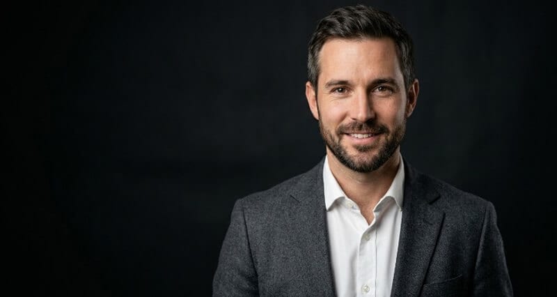 Do AI Headshots Trigger Uncanny Valley? The Trust Science