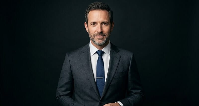 Why Your Smiling Headshot Might Be Hurting You