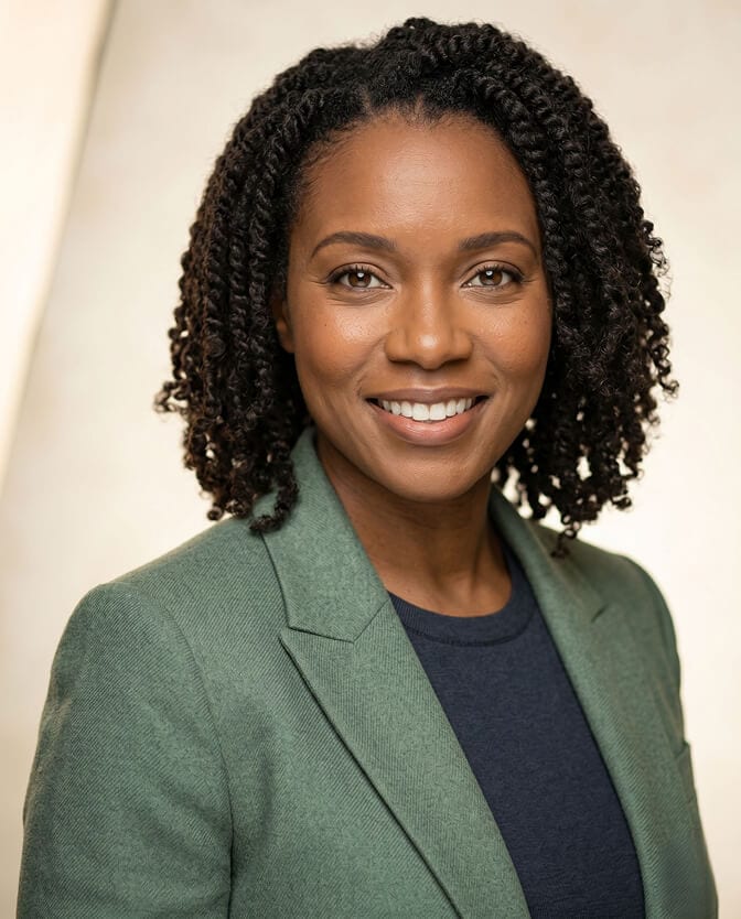 Five spring 2026 headshot colors that photograph beautifully: sage green, rich teal, chocolate brown, muted coral, and burgundy