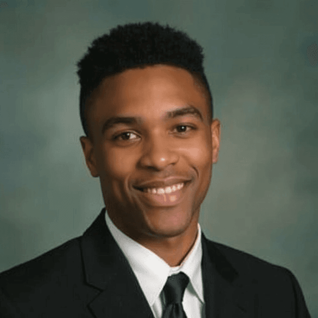 AI-generated yearbook headshot of a male with blurred green gradient backdrop.