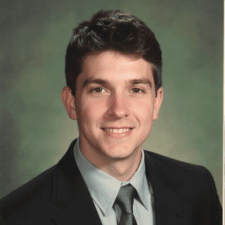 AI-generated yearbook headshot of a white man with short dark brown hair